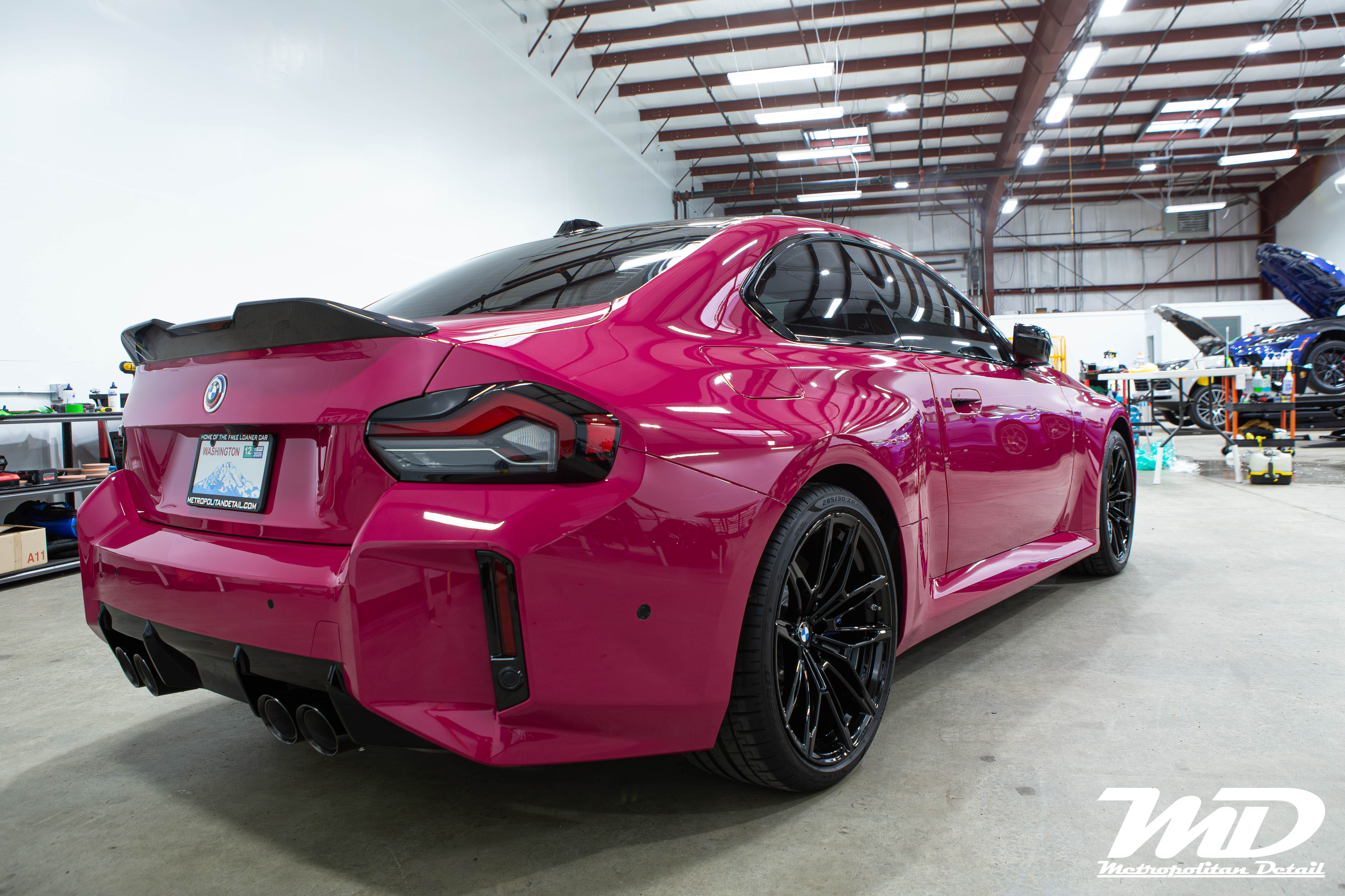 BMW M2 in Rubystone color change film at Metropolitan Detail